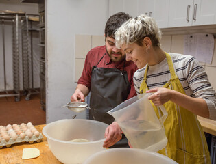 Bakers preparing dough for bread