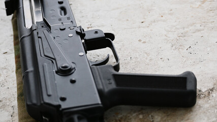 Trigger and safety catch of the receiver of the Kalashnikov assault rifle with firing mode...