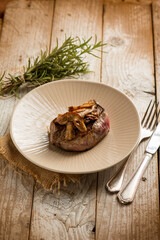 grilled tenderloin with boletus mushroom and herbs