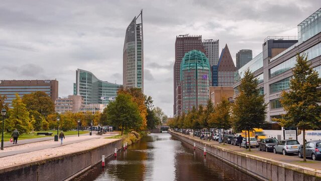 Day Time Lapse of canal in autumn scene in Den Haag with skyline, Zuid-Holland, The Netherlands