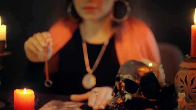 Witch doing good for person using photo, magic ritual, witchcraft, mystery world