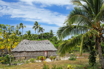 Traditional Kanak house on Ouvea Island,  Loyalty Islands, New Caledonia - obrazy, fototapety, plakaty