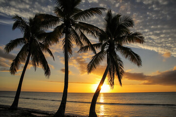 Sunset over Ouvea lagoon on Ouvea Island, Loyalty Islands, New Caledonia - obrazy, fototapety, plakaty