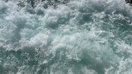 Fototapeta na wymiar water wave on the rocks