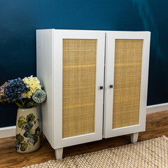 Gray simple furniture with rattan doors boho style