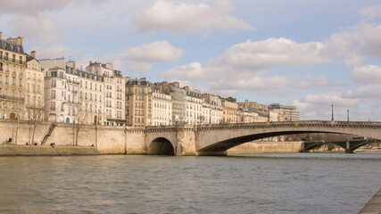 Obraz premium View of Île Saint-Louis and Pont de la Tournelle over the Seine in Paris, France