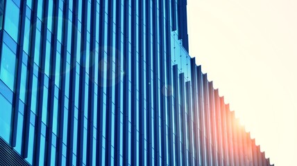 Obraz premium Fragments of building in business district of modern city. High-rise office building in downtown. Modern architecture of typical concrete, glass and steel. Cross process photo filter.
