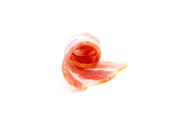 Bacon roll, raw smoked pork meat isolated on white background