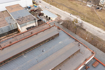 The roof of the old industrial plant building in Kiev. Aerial drone view.