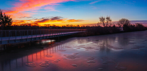 Beautiful Kansas sunrise in Winter Pracht wetlands park in Wichita Kansas frozen
