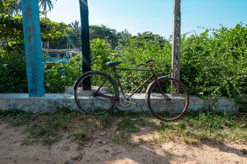 old bicycle in topical country sri lanka.