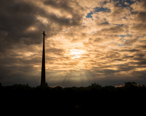Naklejka premium Drone photo of sun rays through clouds in Wichita Kansas at sunrise