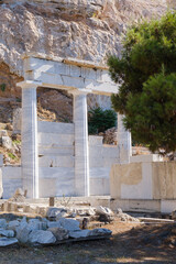 Ancient Greek columns and remains of portico at foot of pantheon in Athens, Greece