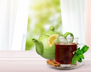 Refreshing and healthy tea in a cup of glass