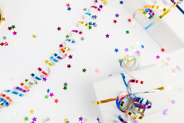 Festive decorations and notebook with wish list on white background , flat lay . Planning concept.- Image