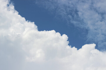 white clouds in the blue sky