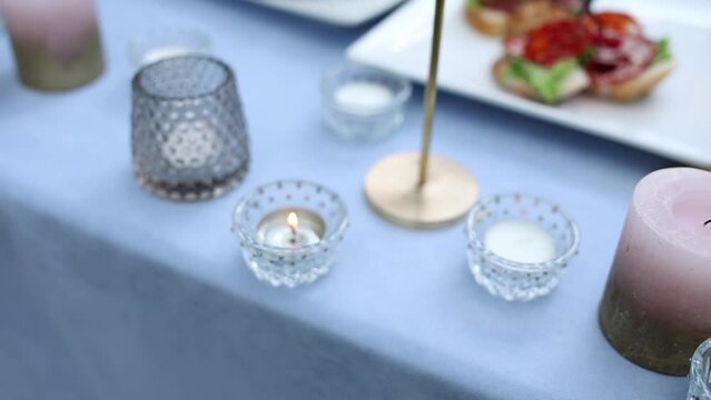 decor of candles on the festive table in the restaurant