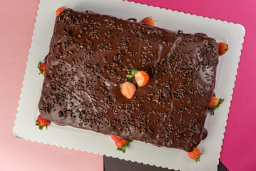 chocolate cake with strawberry and sprinkles
