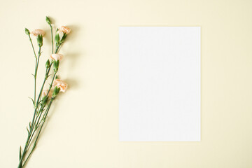 Invitation paper mockup with flowers leaf