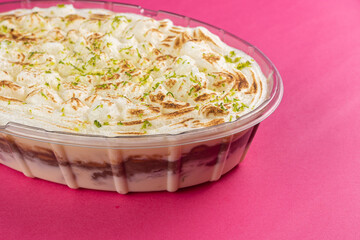 Lemon mousse with meringue and chocolate