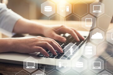 Businessman hand working on keyboard modern laptop and bokeh