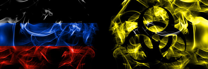 Donetsk People's Republic vs Biohazard, Virus, Covid flag. Smoke flags placed side by side isolated on black background.