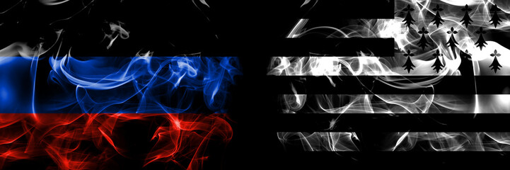 Donetsk People's Republic vs Brittany, Bretagne, Bretons flag. Smoke flags placed side by side isolated on black background.