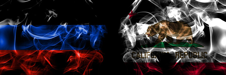 Donetsk People's Republic vs California flag. Smoke flags placed side by side isolated on black background.
