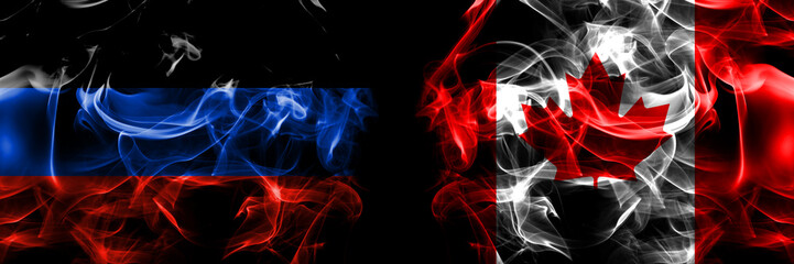 Donetsk People's Republic vs Canada, Canadian flag. Smoke flags placed side by side isolated on black background.
