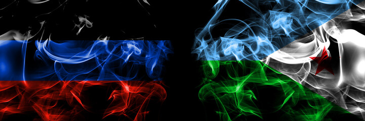 Donetsk People's Republic vs Djibouti, Djiboutian flag. Smoke flags placed side by side isolated on black background.