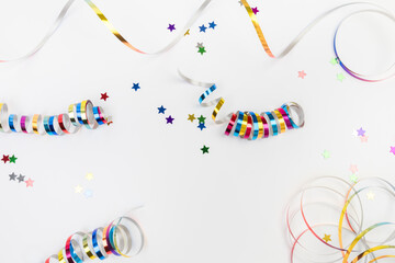 Colorful confetti on white background text place .