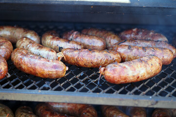 Charcoal cooking. Shish kebab, kobasa on coals.