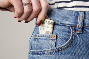 Woman with 20 euros in her pocket