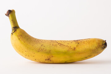 ripe banana sore white table, white background