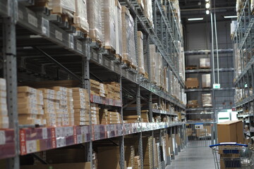 Fototapeta na wymiar Storage of goods in the warehouse. Warehouse in a shopping center.