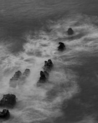 waves on a sea stack
t