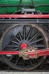 Detail of wheels of a vintage steam train locomotive