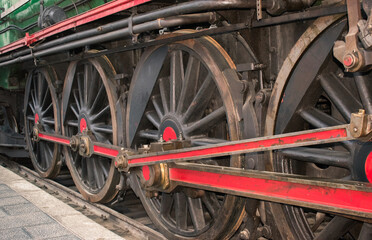 Detail of wheels of a vintage steam train locomotive