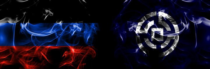 Donetsk People's Republic vs Japan, Japanese, Kushiro, Town, Hokkaido, Kushiro, Subprefecture flag. Smoke flags placed side by side isolated on black background.
