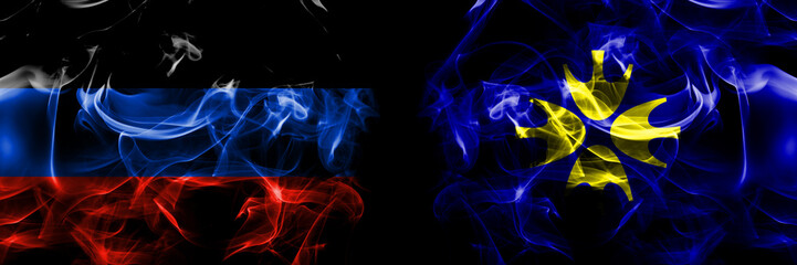 Donetsk People's Republic vs Japan, Japanese, Niikappu, Hokkaido, Hidaka, Subprefecture flag. Smoke flags placed side by side isolated on black background.