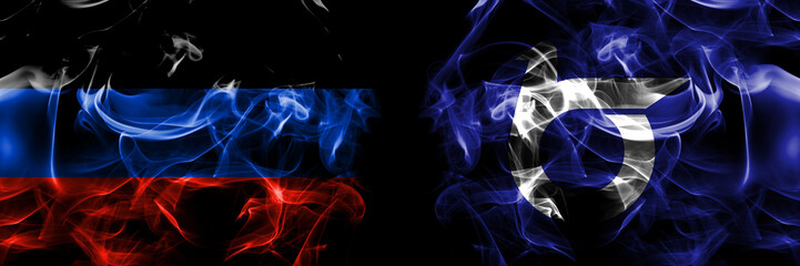 Donetsk People's Republic vs Japan, Japanese, Tottori Prefecture flag. Smoke flags placed side by side isolated on black background.