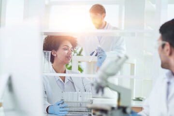 Team of Medical Research Scientists Working on Generation Experimental Drug