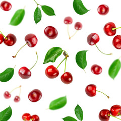 Background of cherry berries and green leaves on a white background.