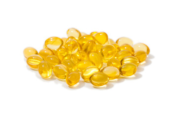 Close up of  oil filled capsules suitable for: fish oil, omega 3, omega 6, omega 9,  vitamin A, vitamin D, vitamin D3, vitamin E - Image