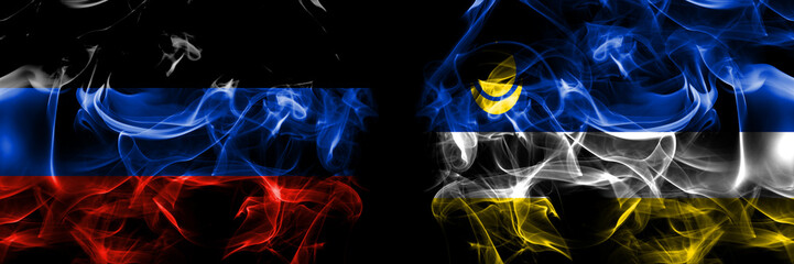 Donetsk People's Republic vs Russia, Buryatia flag. Smoke flags placed side by side isolated on black background.