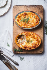Fish pie on chopping board