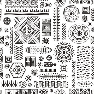 Black and white seamless background African art decoration tribal geometric shapes pattern. Pen and ink drawing of ancient ethnic traditional symbols. Hand-drawn oriental elements in doodle style.