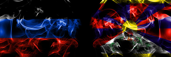 Donetsk People's Republic vs Tibet, Tibetan, China, Chinese  flag. Smoke flags placed side by side isolated on black background.