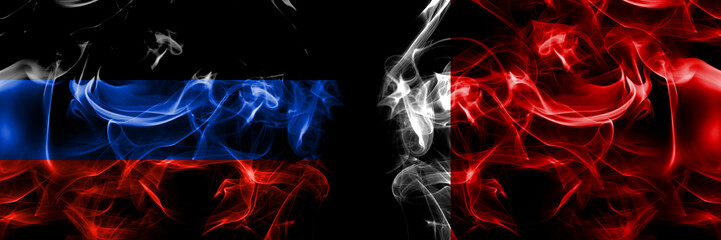 Donetsk People's Republic vs UAE, United Arab, Emirates, Dubai, Ajman flag. Smoke flags placed side by side isolated on black background.
