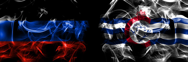 Donetsk People's Republic vs United States of America, America, US, USA, American, Cincinnati, Ohio flag. Smoke flags placed side by side isolated on black background.
